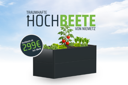 Zu sehen ist ein Hochbeet mit Tomaten